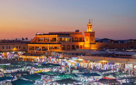 Elevated street view of market stalls and restaurants at Jemaa el-Fnaa in the Old Town Medina area of Marrakech, west Morocco