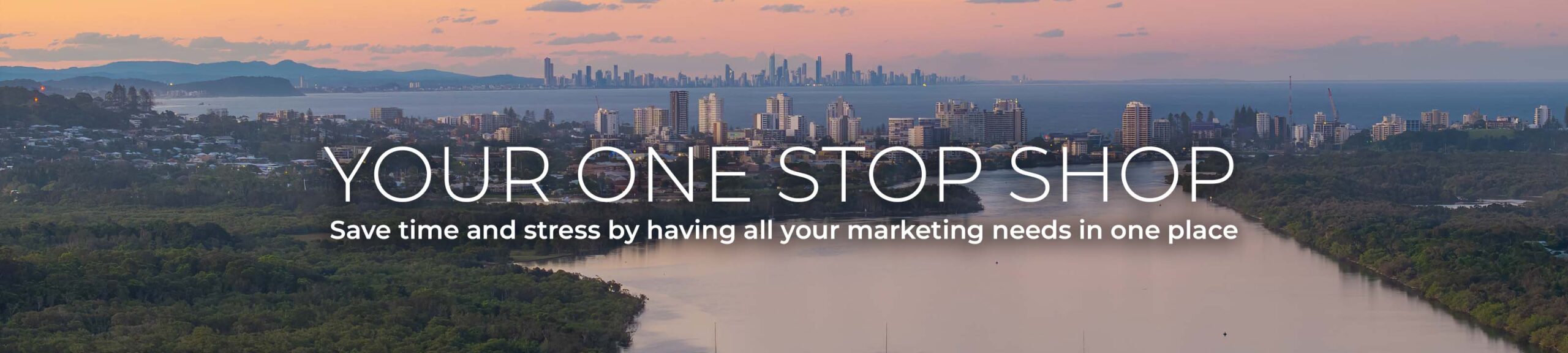 Aerial sunset views of Tweeds Heads and Coolangatta with the Gold Coast skyline in the background